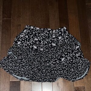 Girls light pink and black skirt
